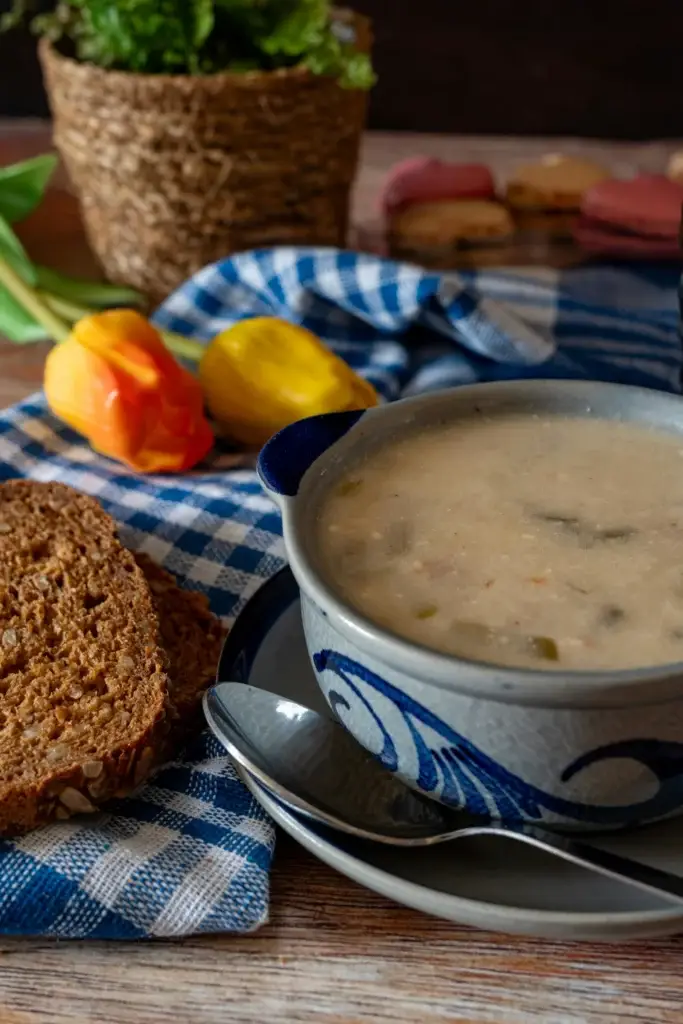 Smooth leek and potato soup topped with fresh chives.